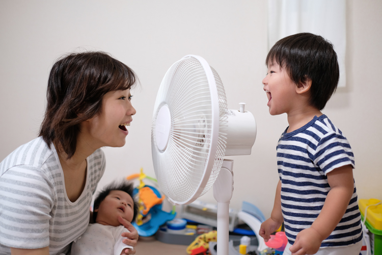 mom and son playing